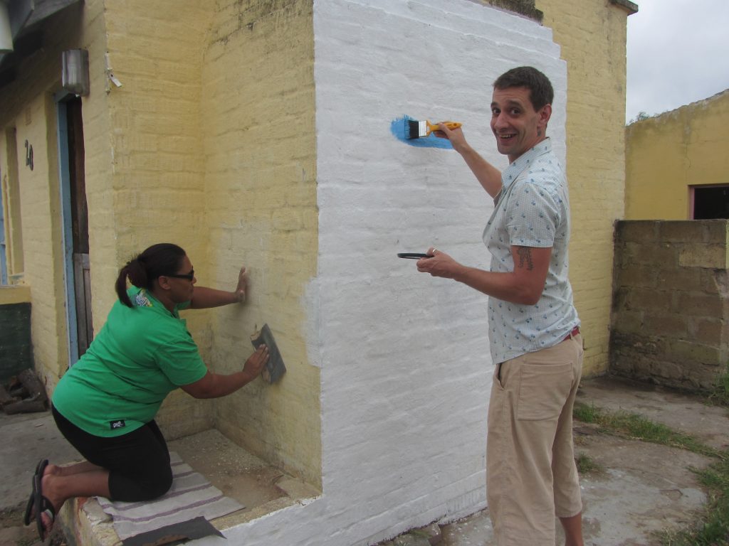 Bruce and Samantha prepping the wall