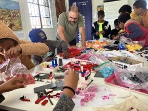 DC kids working with lego