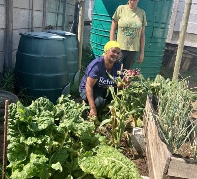Sustainability Projects - Rachel and Chrishene growing food at the new home office